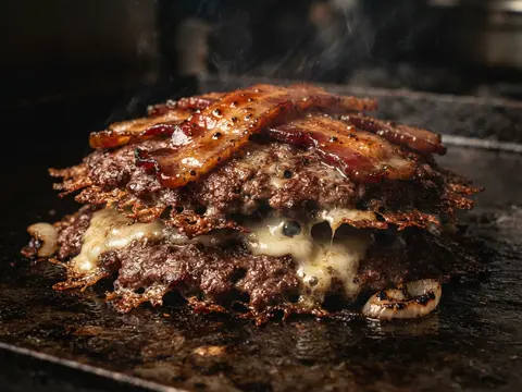 Concept imagery: candied bacon caramelizing in a hot pan